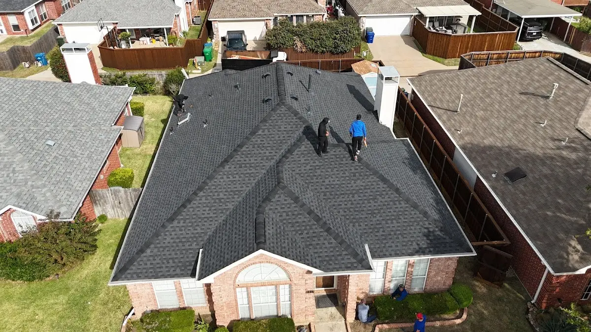 Slate & Tile Roof Repair work in progress on a Irving property