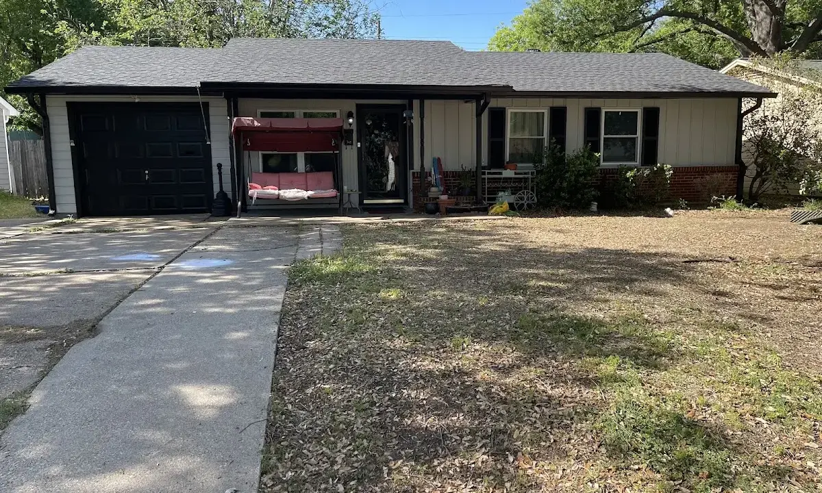 Asphalt Shingle Roof Repair crew at work on a residential roof in Irving